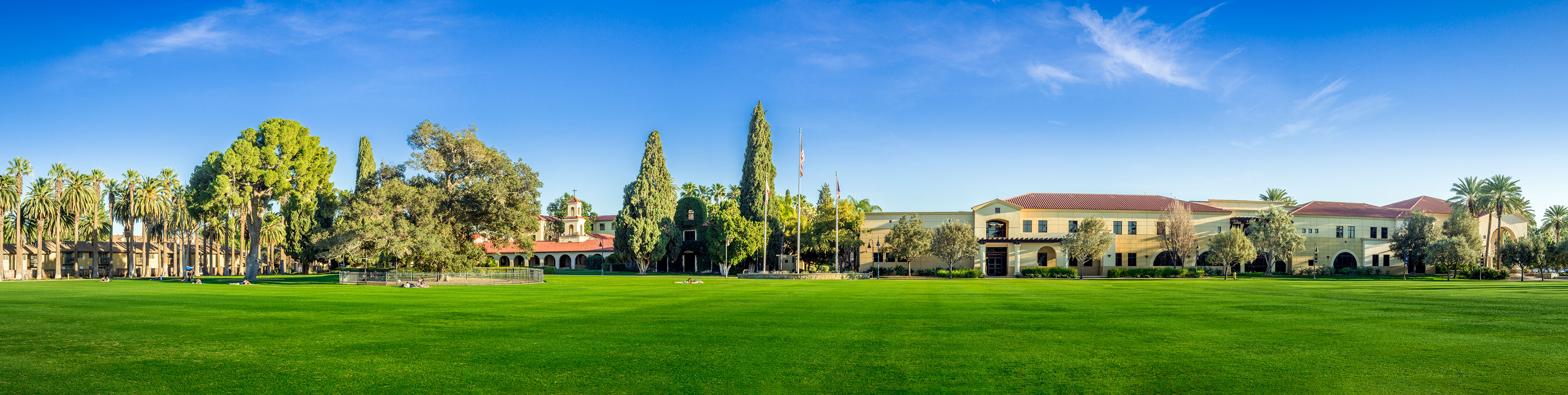 Stamps Courtyard on the California Baptist University campus with colorful clouds overhead during sunset