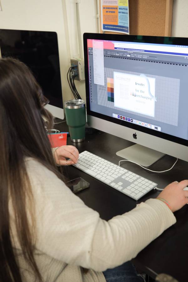 A California Baptist University working on a computer