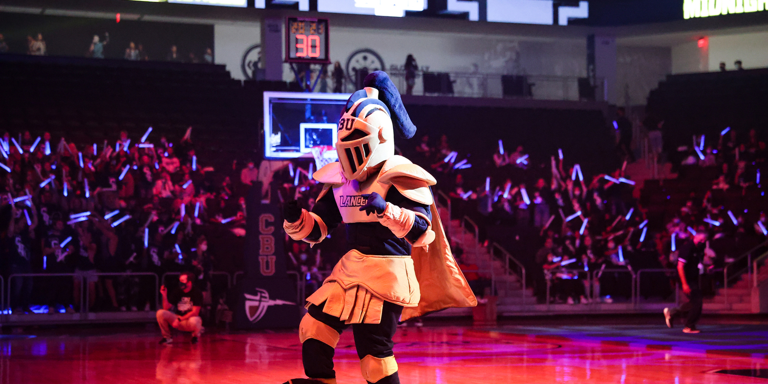CBU mascot on the court at a basketball game