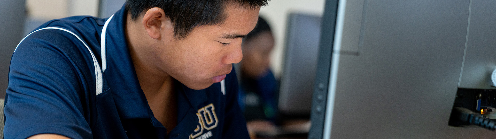 student on computer