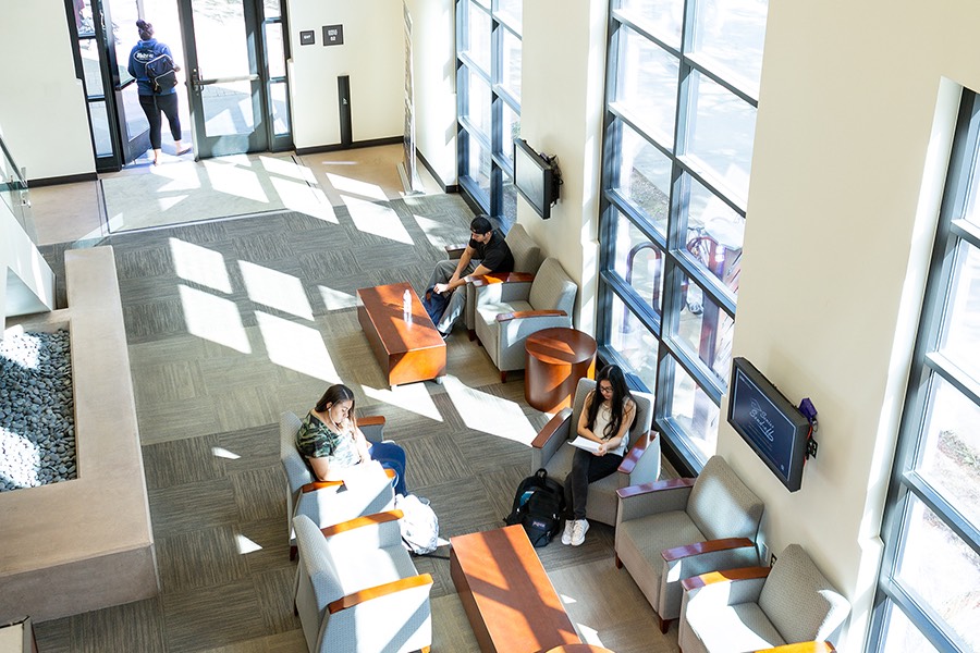 CBU students studying in the lobby of a campus building