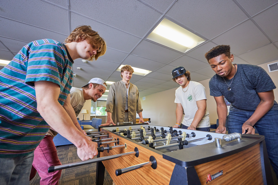 CBU students playing foosball